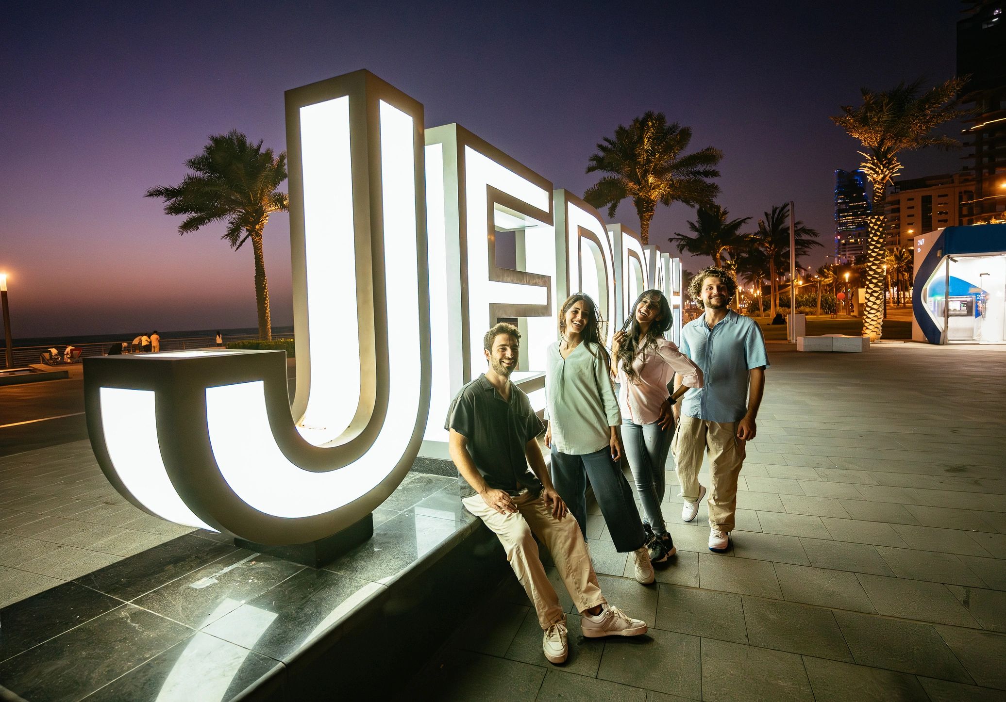 Illuminated large-format sign at night